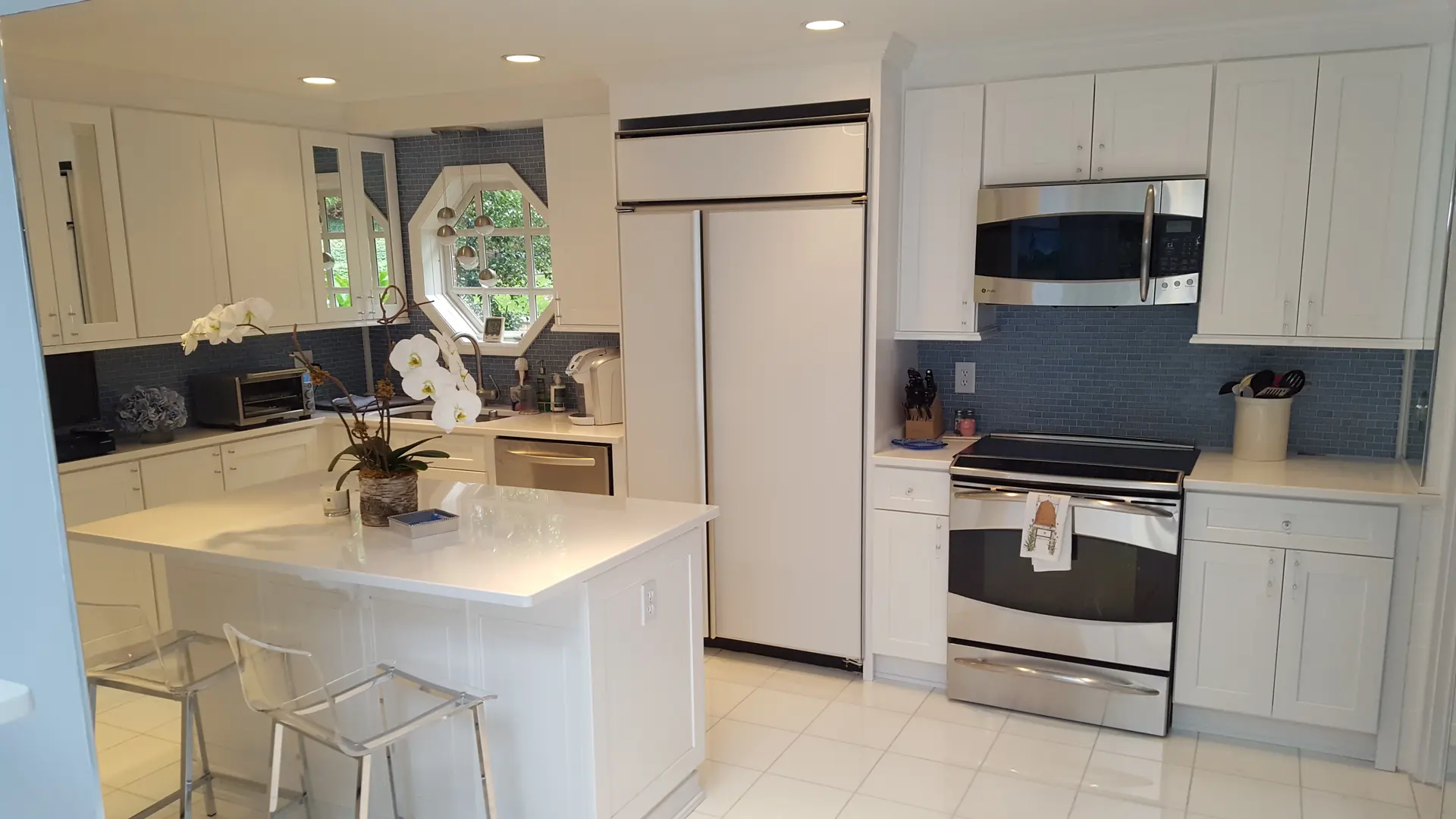 Remodeled white kitchen with island